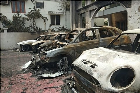 Fleet of Charred cars by the bomb hurling incident