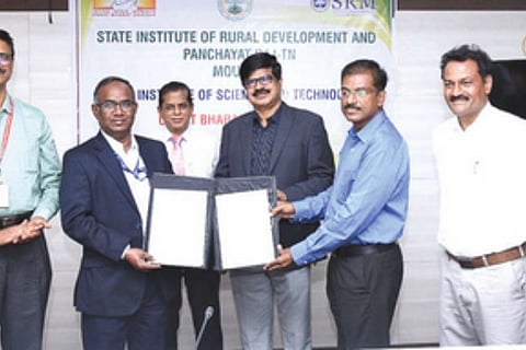 SRMIST and State Institute of Rural Development and Panchayat Raj officials signing the MoU
