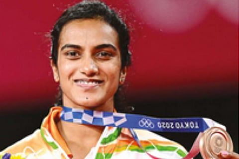 PV Sindhu poses with the women?s singles badminton bronze medal