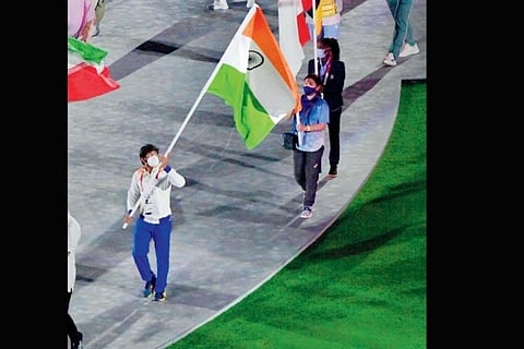 Source: PTI; Bajrang Punia leads during the closing ceremony of Tokyo Olympics