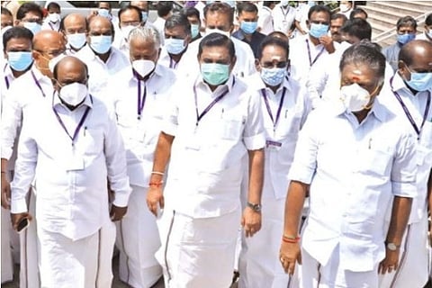 AIADMK MLAs led by former CMs Edappadi K Palaniswami and O Panneerselvam coming out the Assembly