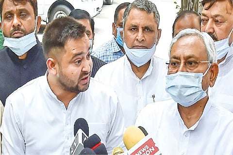 Bihar CM Nitish Kumar and Tejashwi Yadav interacting with the media after meeting PM Narendra Modi