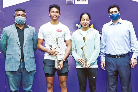 Velavan, Tanvi clinch titles