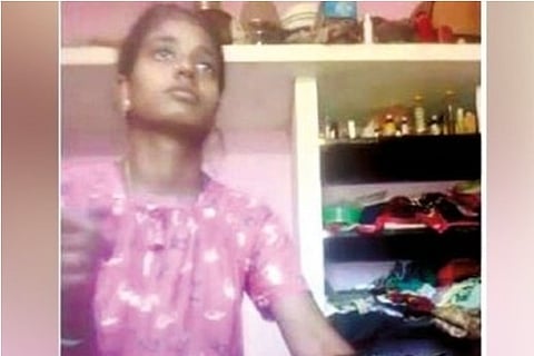Screengrab of Thulasi beating her son
