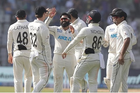 New Zealand spinner Ajaz Patel celebrates his 10 wicket haul with team mates (Photo: Twitter)