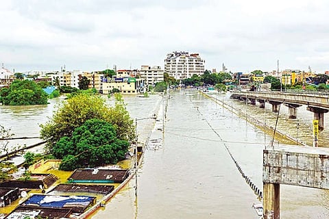 Houses with electricity connections near a watercourse (File Photo)