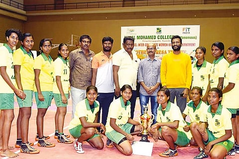 Jamal Mohamed College team members pose with the winner's trophy