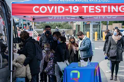 A mobile covid testing site in UK. Image Courtesy: Reuters