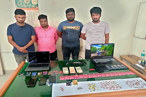 Accused along with seized materials
