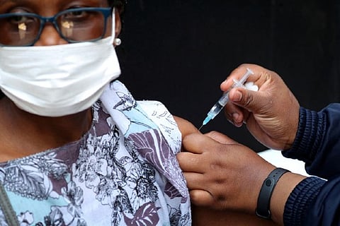 A healthworker gets the Johnson and Johnson jab.