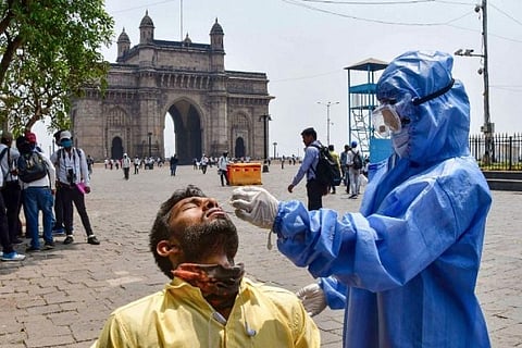 A health worker taking RT-PCR test (Image credit: PTI)