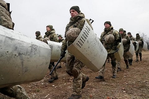 Members of the Ukrainian State Border Guard Service attend a training session (Credit: Reuters)