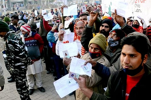 Voters stand in queues to cast their votes in the Chandigarh Municipal Corporation elections 2021