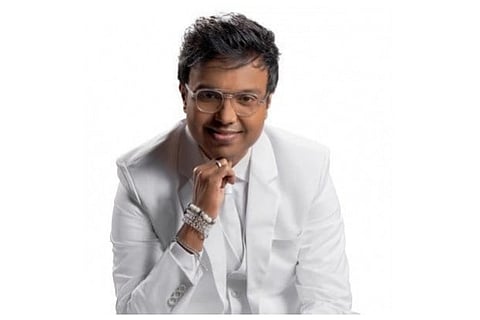 Music director Imman