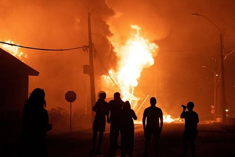 Protests erupt in Chilean lakeside resort after street performer shot by police