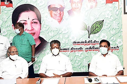 Chief Minister Palaniswami and AIADMK party coordinator Paneerselvam during the district secretaries