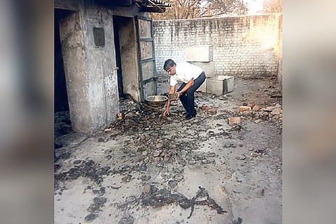 Deputy Chief Controller of Explosives K Sundaresan collecting samples from the exploded carcker unit