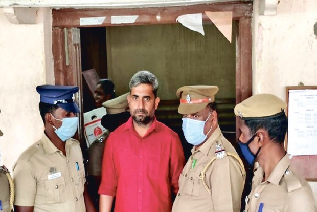Convict Danish Patel being brought out of the Mahila Court in Pudukkottai on Thursday