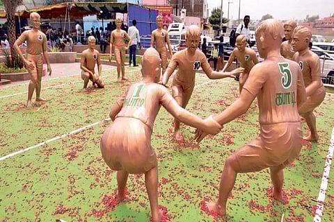 Sculptures of kabaddi players in action installed at Palam Station road roundabout in Sellur