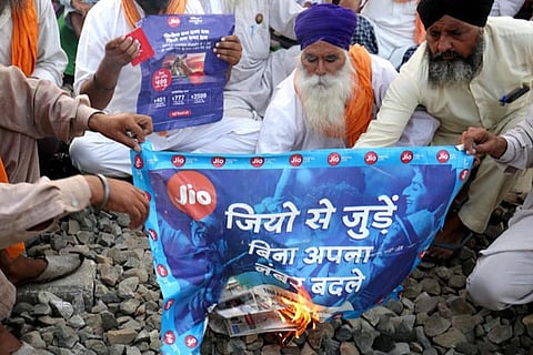 Amid reports of telecom tower vandalism, Reliance says it has no plans for corporate farming