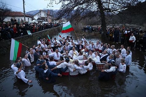 Bulgarians dance in cold waters to celebrate Epiphany, defying COVID curbs