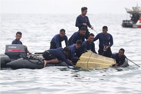 Source: AP; Sea divers recover parts of the debris of the ill-fated Sriwijaya plane