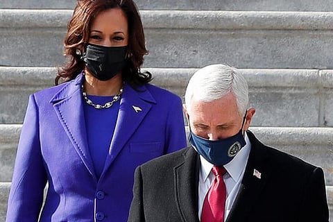 Trump's vice president Mike Pence applauds successor Kamala Harris