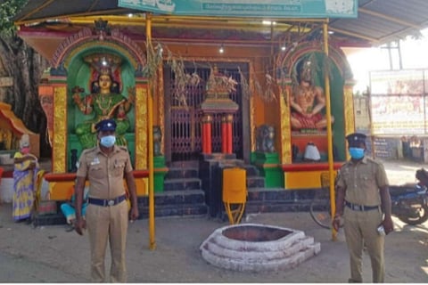 Police personnel keeping a watch over the temple in controversy at MV Kuppam, a village near Pernumb