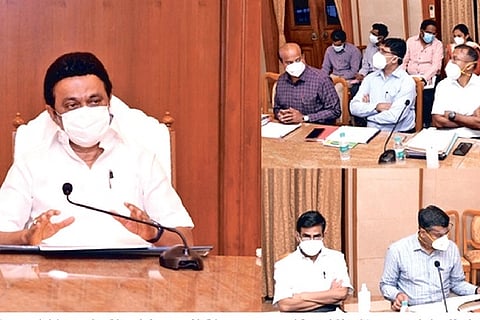 Stalin chairing a meeting with officials of Coop and food departments