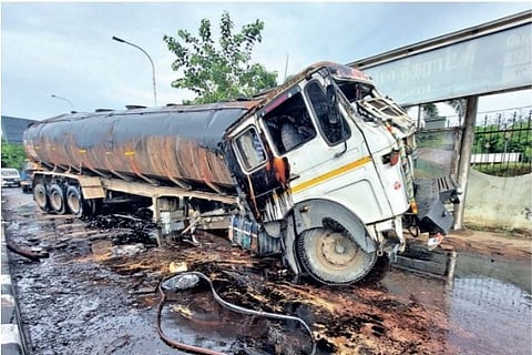 The tanker overturned on Durgabai Deshmukh Road after hitting the median