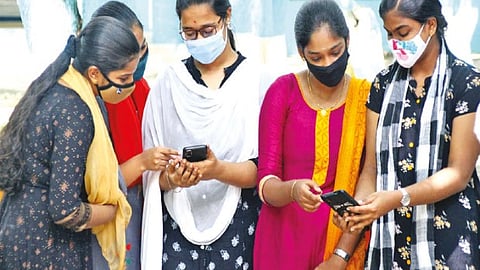 Representative image of students checking their exam results