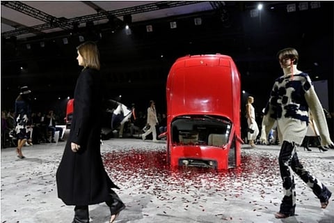 Models showcasing Virgil Abloh creations during Paris Fashion Week (Credit: Reuters)