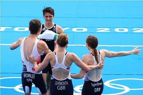 Britain team celebrates after winning gold (Credit: Reuters)