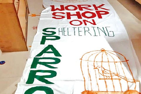 Handpainted cloth banner in the making to create awareness