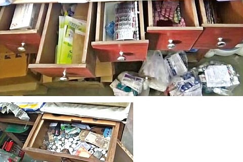 The ransacked drawers of the medical shop with medicines strewn all over