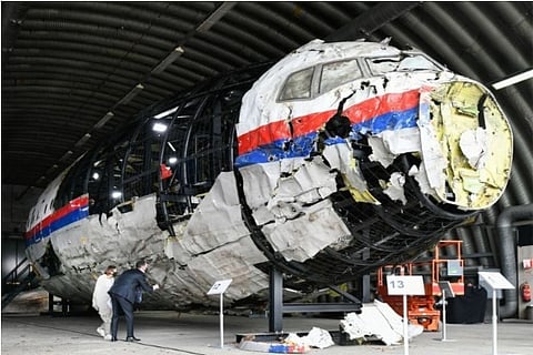File photo: Assembled debris of the Ukraine plane crash is being inspected