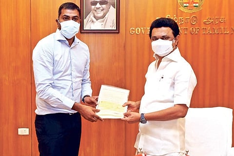 Aadhav Arjuna (left) hands over a cheque of Rs 1 crore to Tamil Nadu Chief Minister MK Stalin