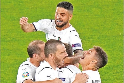Italy players celebrate the opening goal against Turkey in Rome