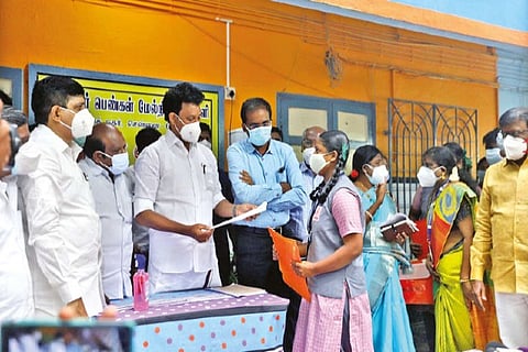 Poyyamozhi during the admission process at a govt school