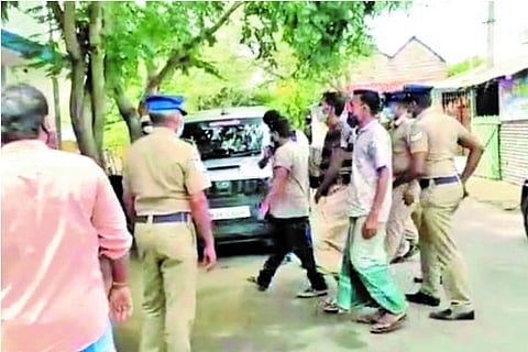 Police taking the three Bangladesh nationals into custody in Tirupur district on Thursday