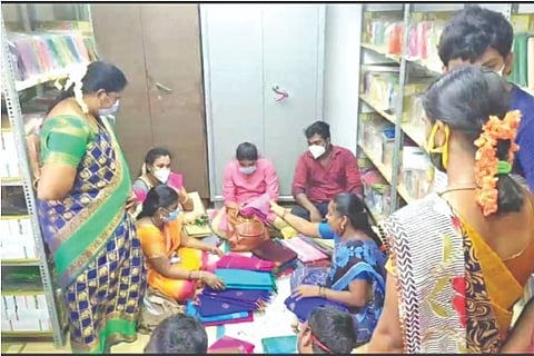 Business as usual inside a textile shop in Kancheepuram