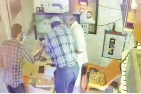 CCTV footage showing the foreigner duo near the cash chest at the fuel station near Pavunjur on Mond