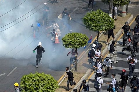 Myanmar court files another charge against Suu Kyi, protesters march again
