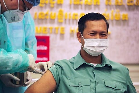 Cambodian Prime Minister Hu Sen taking Covid vaccine jab (Photo: Reuters)