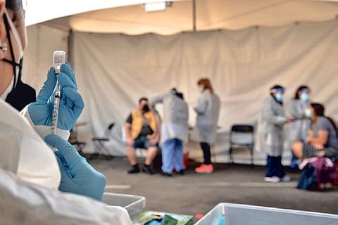 Plan to ditch mask after shots? Not so fast