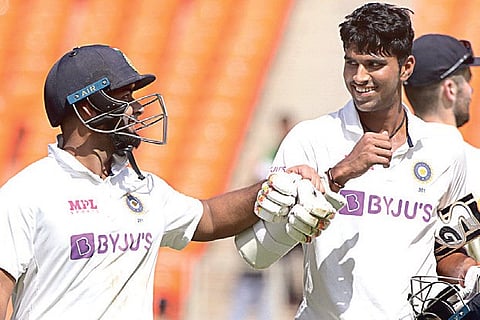 Rishabh Pant (left) shared a 113-run stand with Washington Sundar for the seventh wicket.