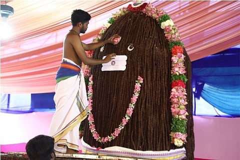 A massive 11 Feet Lingam ecorated with 5 Lakhs Rudrakshas