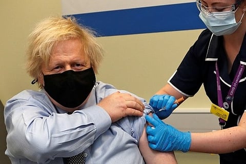 Boris Johnson taking Covid jab (Photo: ANI)