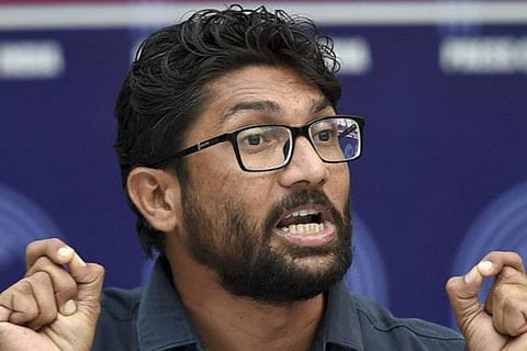 Mevani detained during protest against activist's murder