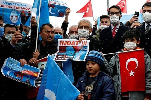 Turkey raises Uighur issue with Chinese minister amid protests